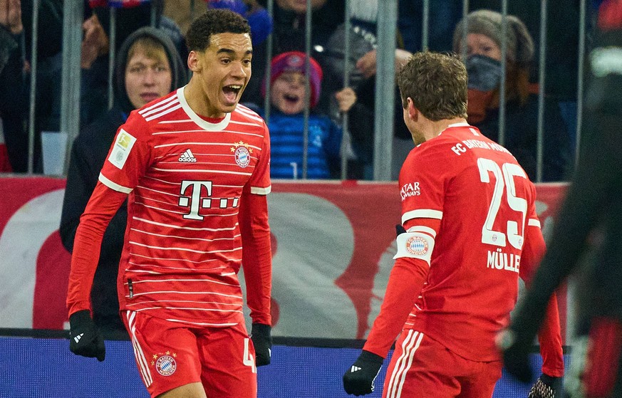 Jamal MUSIALA, FCB 42 celebrates his goal, happy, laugh, celebration, 3-0 with Thomas MUELLER, MÜLLER, FCB 25 in the match FC BAYERN MUENCHEN - 1. FC UNION BERLIN 1.German Football League on Feb 26, 2 ...