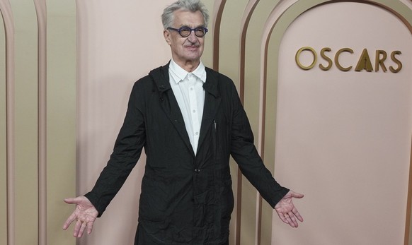 Wim Wenders arrives at the 96th Academy Awards Oscar nominees luncheon on Monday, Feb. 12, 2024, at the Beverly Hilton Hotel in Beverly Hills, Calif. (Photo by Jordan Strauss/Invision/AP)