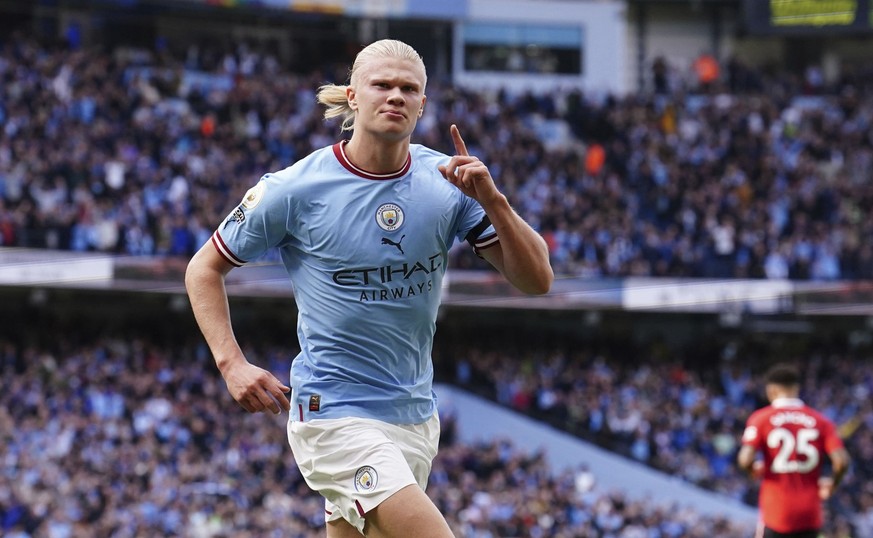 Manchester City&#039;s Erling Haaland celebrates after scoring his side&#039;s second goal during the English Premier League soccer match between Manchester City and Manchester United at Etihad stadiu ...