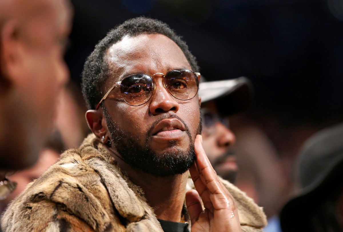 FILE - Sean &quot;Diddy&quot; Combs sits courtside in the second half of an NBA basketball game between the Brooklyn Nets and the New York Knicks, March 12, 2017, in New York. (AP Photo/Kathy Willens, ...