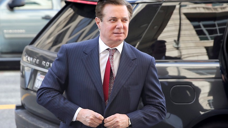 Former Trump campaign manager Paul Manafort arrives for arraignment on a third superseding indictment against him by Special Counsel Robert Mueller on charges of witness tampering, at U.S. District Co ...