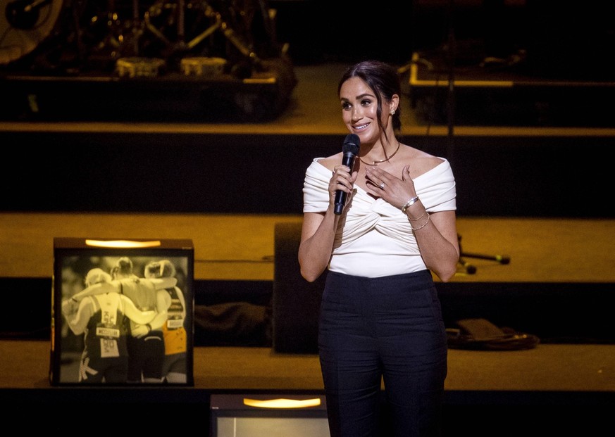 2022-04-16 19:48:34 La Haya - La duquesa de Sussex, Meghan Markle, en la ceremonia inaugural de los Juegos Invictus, un evento deportivo internacional para soldados y veteranos que eran psíquicos...