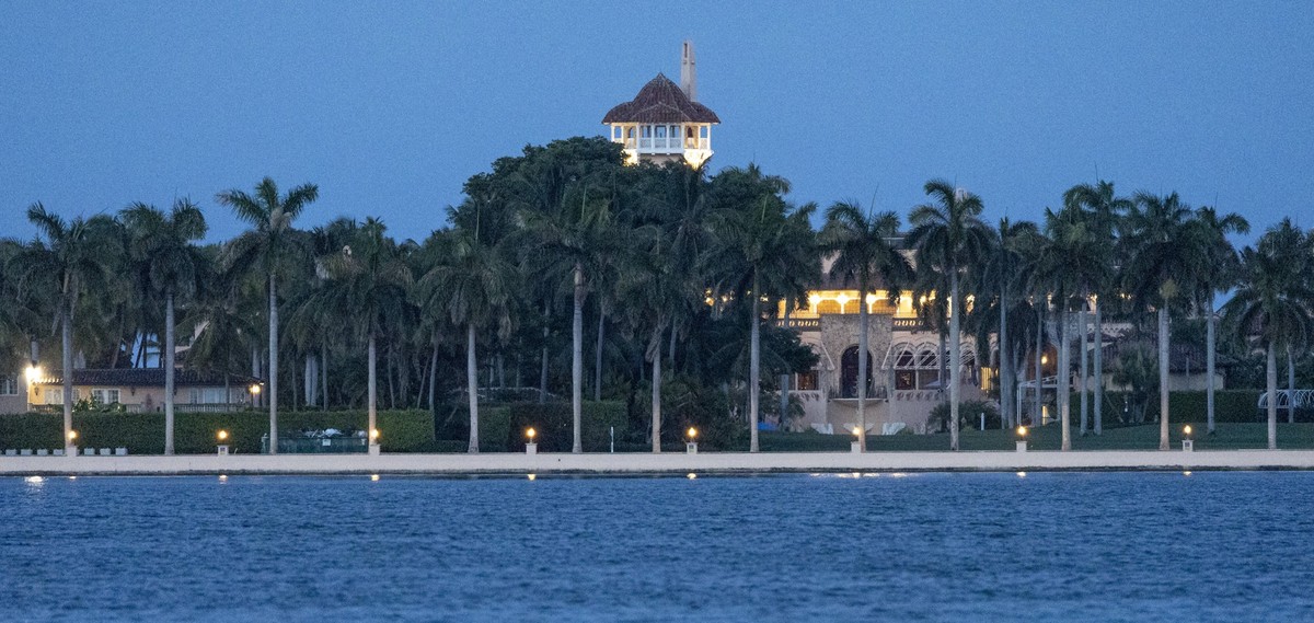 The home Mar-A-Lago, of former President Donald Trump is seen from across the inter-coastal after the FBI executed a search warrant for documents that he took home after his presidency to Mar-A-Lago i ...