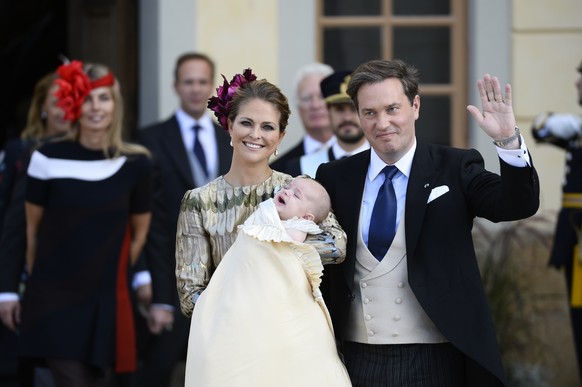 FILE - In this Sunday, Oct. 11, 2015 file photo, Sweden's Princess Madeleine and Christopher O'Neill pose with their son Prince Nicolas after his baptism ceremony, at the Drottningholm Palace Church,  ...