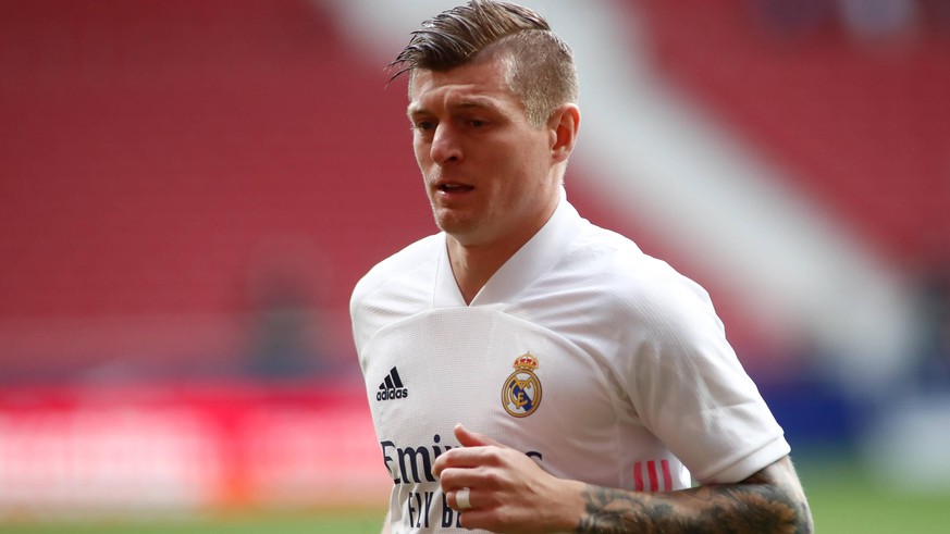 March 7, 2021, MADRID, MADRID, SPAIN: Toni Kroos of Real Madrid looks on during the spanish league, La Liga Santander, football match played between Atletico de Madrid and Real Madrid at Wanda Metropo ...