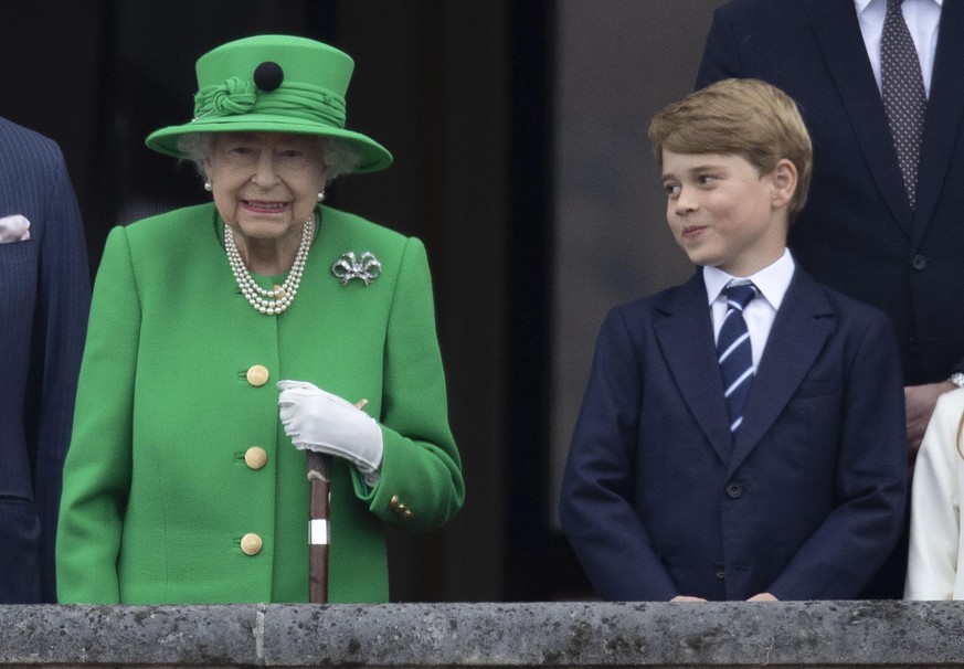 Queen Elizabeth II on the balcony of Buckingham Palace with Prince Charles, Camilla, Duchess of Cornwall, Prince William , Catherine, Duchess of Cambridge,, Prince George, Princess Charlotte and Princ ...