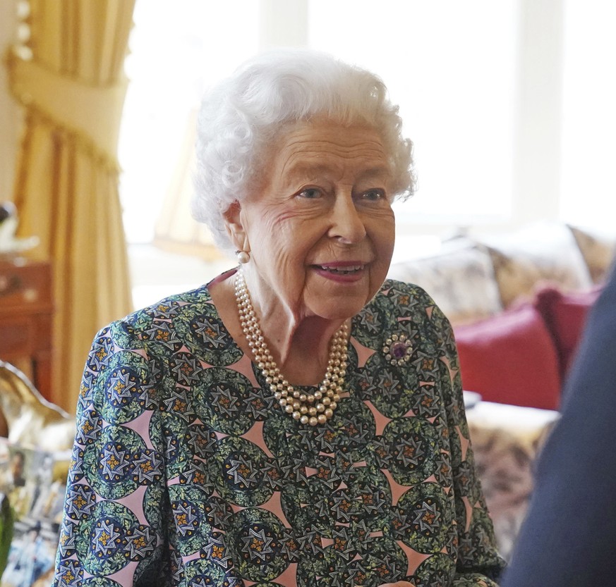 Queen Elizabeth II speaks during an audience at Windsor Castle where she met the incoming and outgoing Defence Service Secretaries, Wednesday Feb. 16, 2022. (Steve Parsons, Pool via AP)