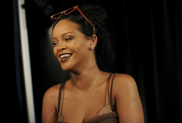 Rihanna talks to media backstage after Savage X Fenty fashions are shown in a performance at the Brooklyn Navy Yard at the end of Fashion Week, Wednesday Sept. 12, 2018, in the Brooklyn borough of New ...